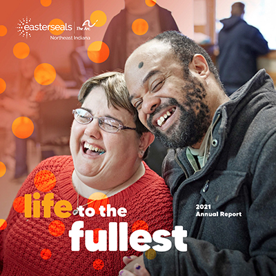 Cover of annual report with man and woman smiling together and title Life to the Fullest