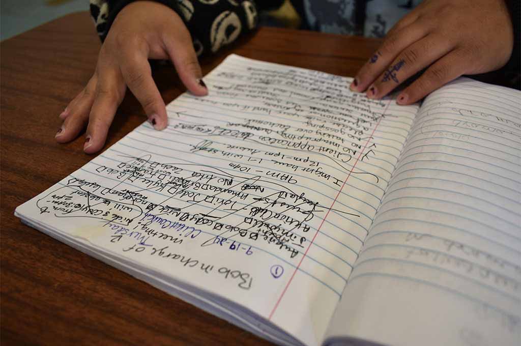 Easterseals RISE Aubrie creates notes for client council meeting
